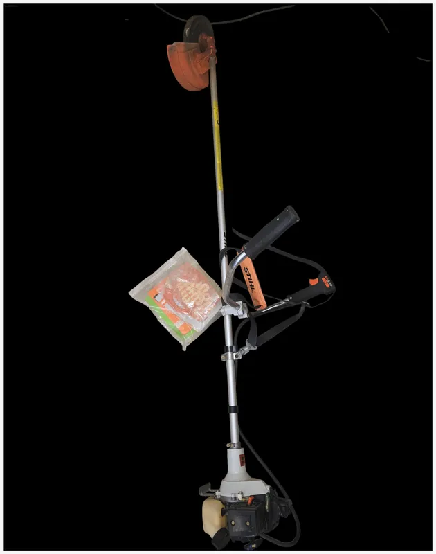 STIHL FS 66 Gas-Powered Straight Shaft Brushcutter with Accessories from auction in Lancaster, Ohio — image 41