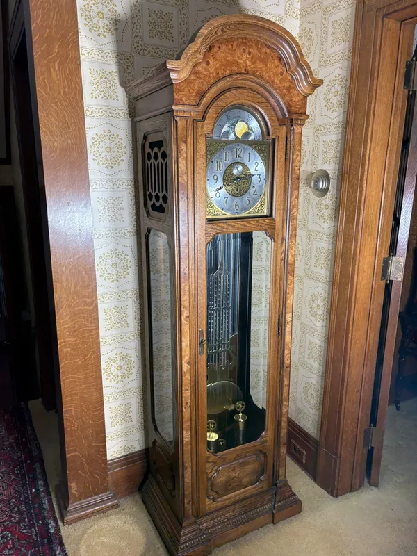 Howard Miller Oak and Burl Oak Triple Chime Grandfather Clock with Moon Phase from auction in Lancaster, Ohio — image 31
